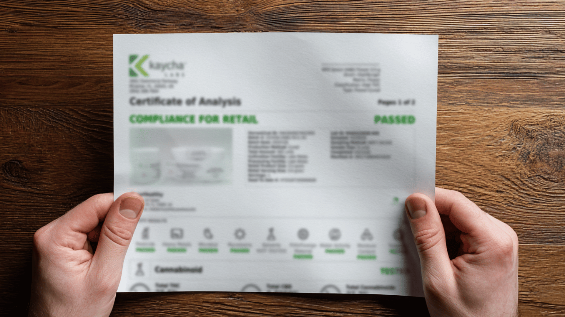 Certificate of Analysis compliance document on wood table