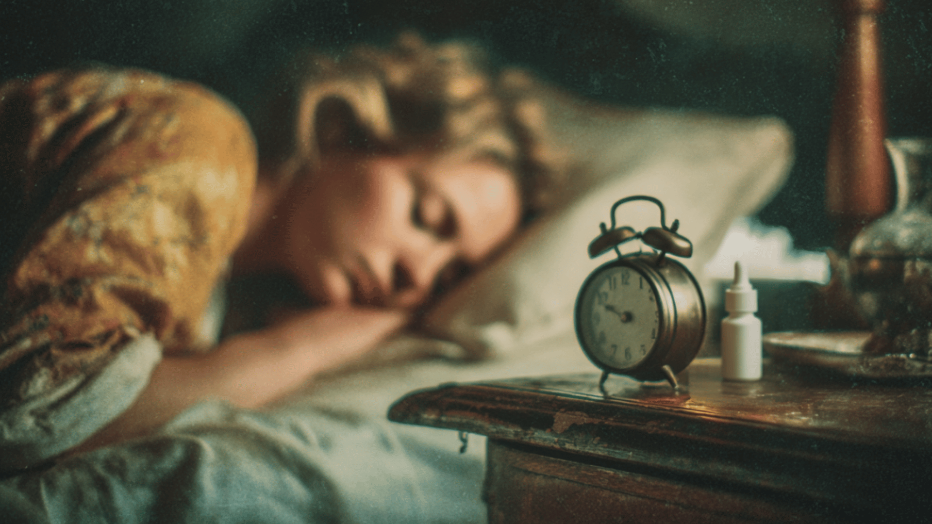 Woman sleeping with vintage alarm clock nearby