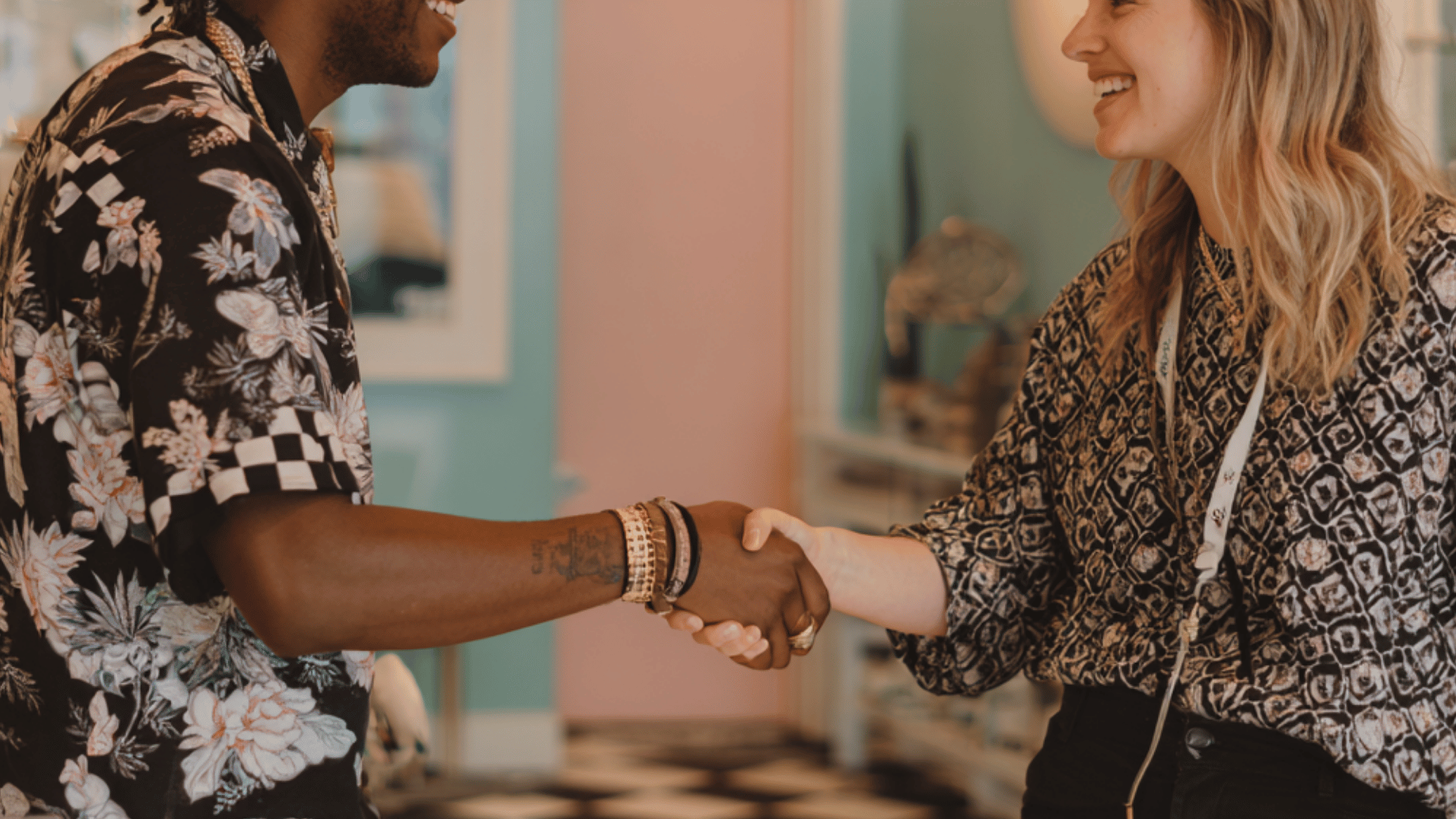 People shaking hands in casual attire