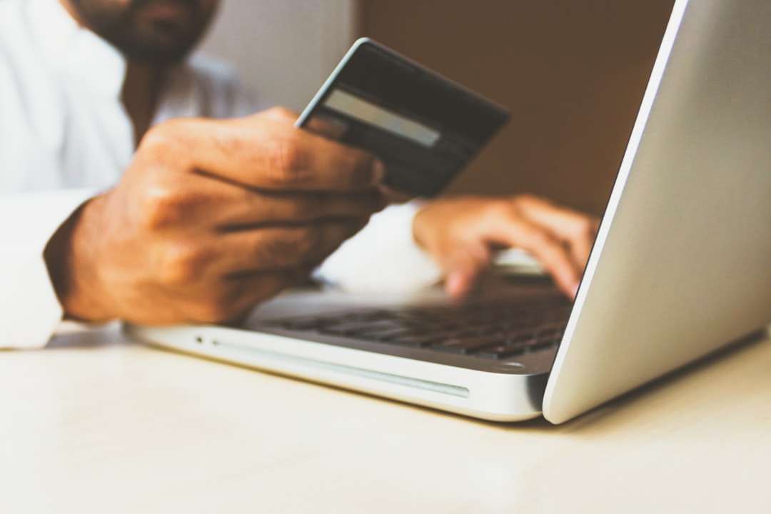 Online shopping with credit card and laptop